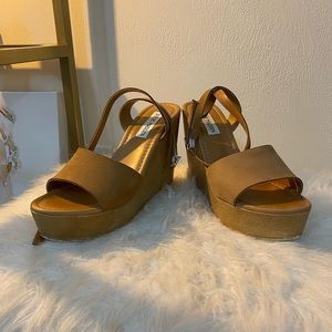 Steve Madden wedges.  Worn only twice.